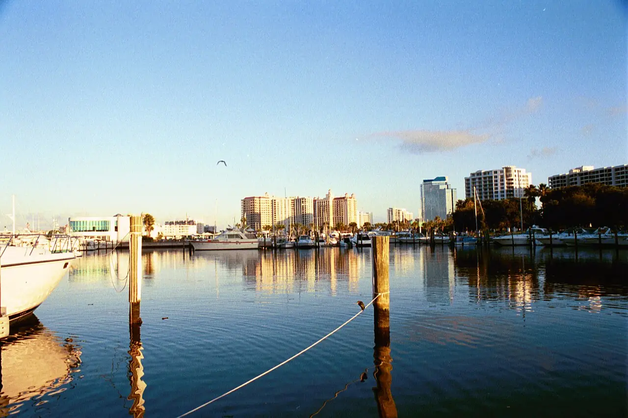 Sunrise over the marina at Bayfront Park, Sarasota, with the downtown skyline behind